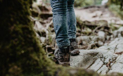 Person walking on countryside path.